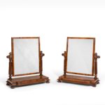 A pair of George IV mahogany table mirrors attributed to Gillows