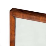 A pair of George IV mahogany table mirrors attributed to Gillows corner