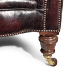 A Victorian walnut Chesterfield sofa castor