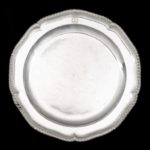 Twelve dinner plates from Admiral Lord Bridport’s seagoing silver service main