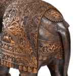 An Indian carved hardwood elephant back detail