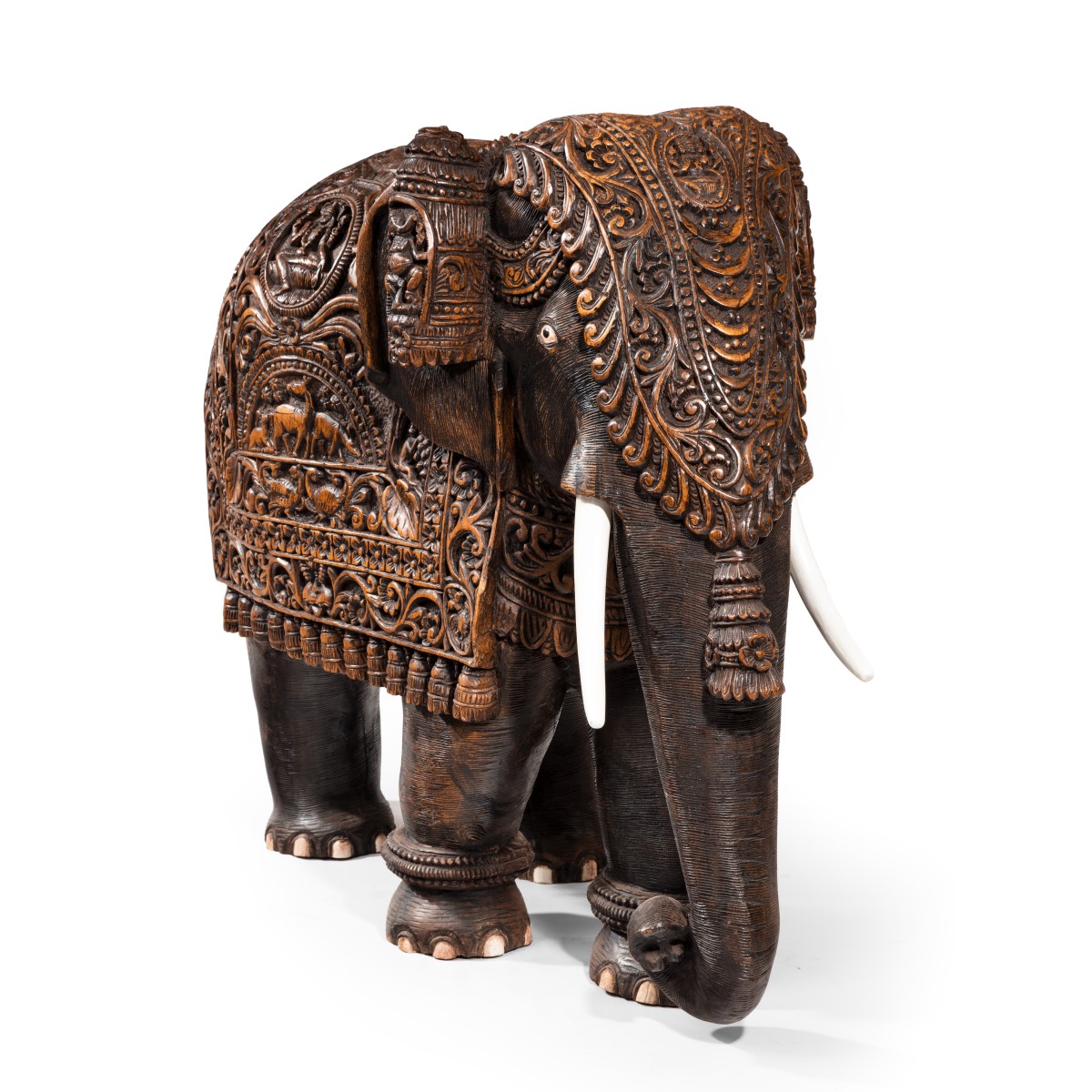 An Indian carved hardwood elephant