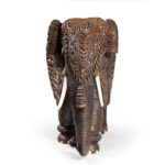 An Indian carved hardwood elephant front