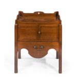 A George III mahogany tray top commode from the Chippendale period front
