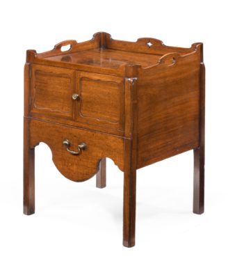 A George III mahogany tray top commode from the Chippendale period