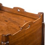A George III mahogany tray top commode from the Chippendale period top