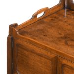 A George III mahogany tray top commode from the Chippendale period corner
