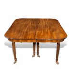An ‘imperial’ action mahogany extending dining table attributed to Gillows closed