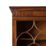 A late George III mahogany secretaire bookcase attributed to Gillows top corner