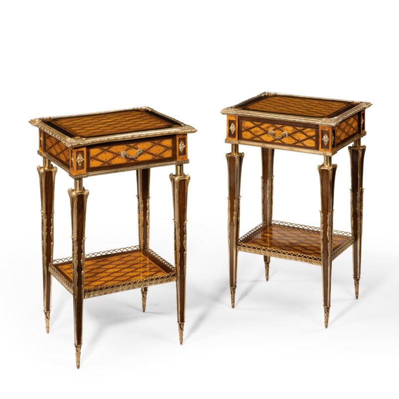 A matched pair of satinwood tables after Donald Ross, retailed by Edwards and Roberts