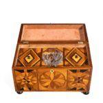 A Jamaican marquetry tea caddy in Caribbean woods by Ralph Turnbull inside