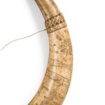 A sailor’s carved cow horn
