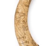 A sailor’s carved cow horn closeup engravings
