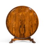 A Regency figured rosewood tilt-top centre table