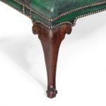 A George III Chippendale period mahogany wing arm chair leg