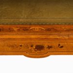 A Victorian walnut marquetry writing table detail