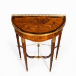 A French demi-lune rosewood bow and arrow table by Georges-François Alix side top