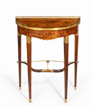 A French demi-lune rosewood bow and arrow table by Georges-François Alix