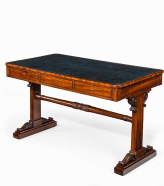 A Regency mahogany end support library table