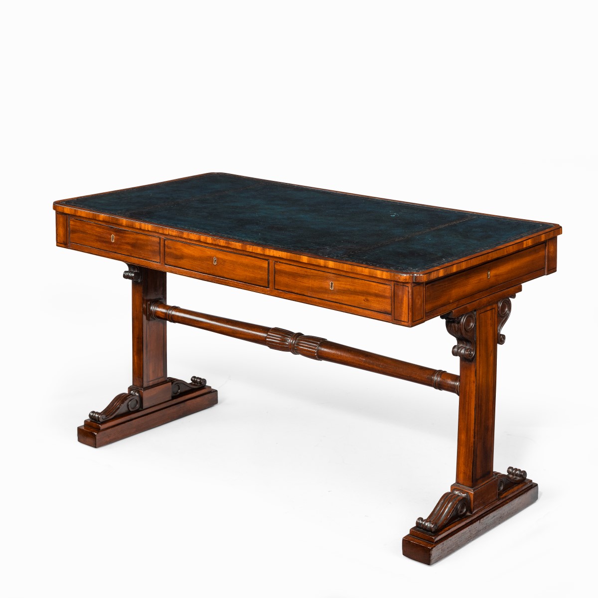 A Regency mahogany end support library table
