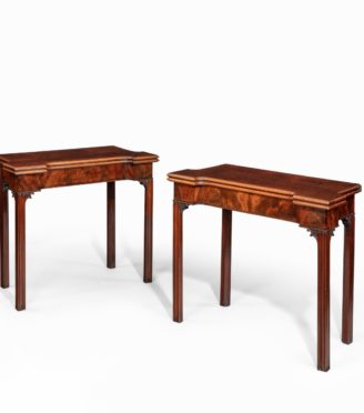 A very fine pair of George III mahogany and plum pudding mahogany concertina action card tables