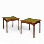 A very fine pair of George III mahogany and plum pudding mahogany concertina action card tables open