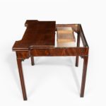 George III mahogany and plum pudding mahogany concertina action card table closed fully extended