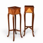 A pair of Anglo-Indian teak stands side
