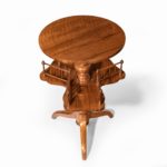 A Victorian walnut revolving book table top