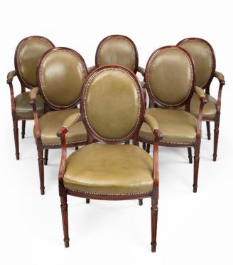 Six Edwardian mahogany chairs by Gill & Reigate