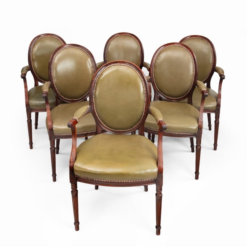 Six Edwardian mahogany chairs by Gill & Reigate