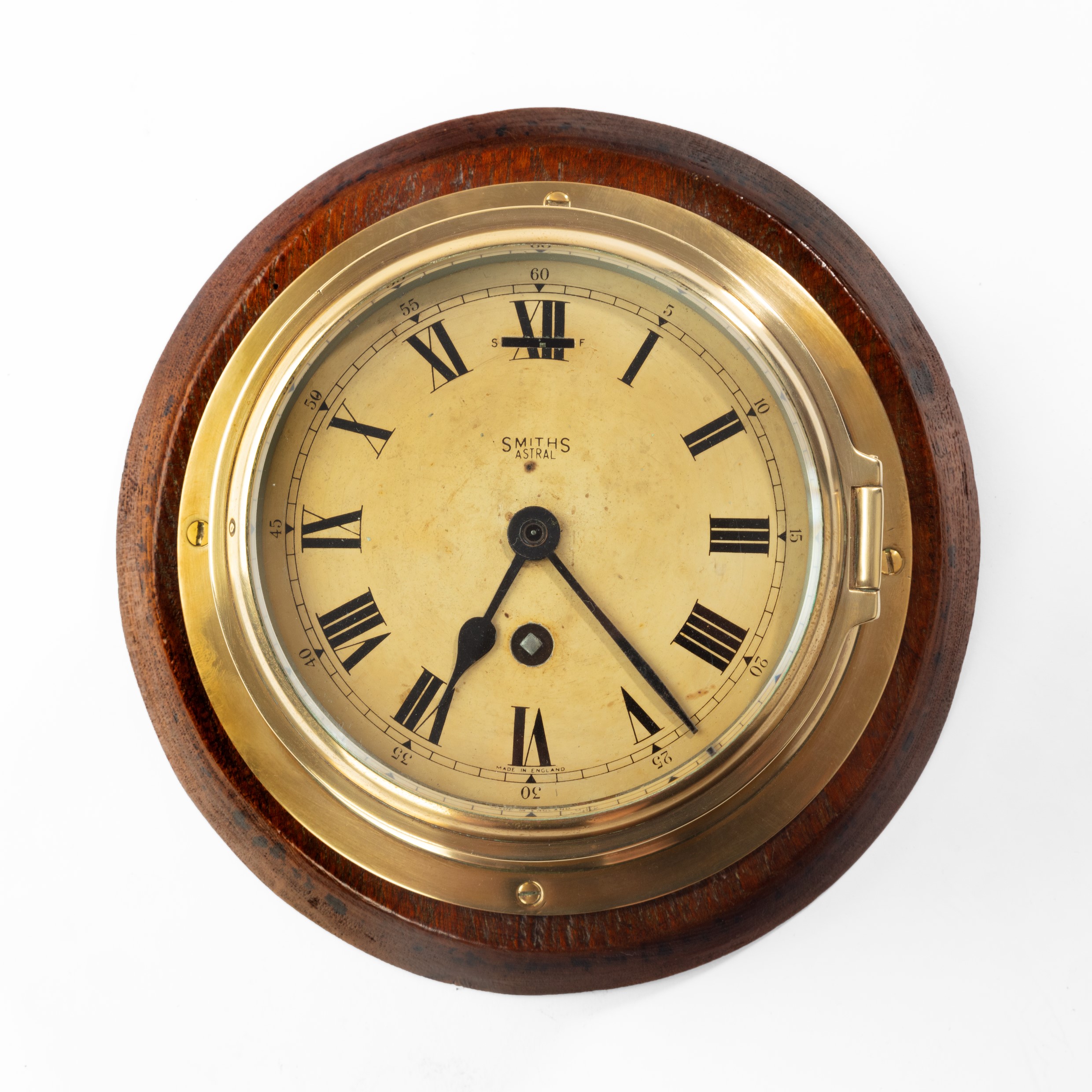 A Smiths Astral brass bulkhead clock