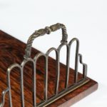 A Regency gilt brass and rosewood book tray, attributed to Gillows detail