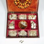 A Victorian Tunbridge-ware parquetry games box open stones