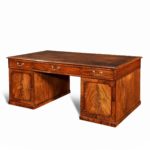 A late George III mahogany partner’s desk