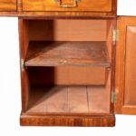 A late George III mahogany partner’s desk open shelves