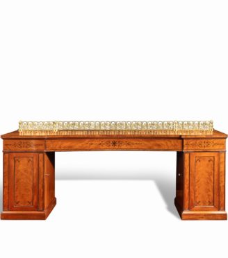 A Regency pale mahogany pedestal sideboard
