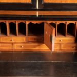An Anglo-Chinese camphor and ebony campaign secretaire bookcase