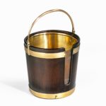 George III mahogany and brass-bound plate bucket handle angle