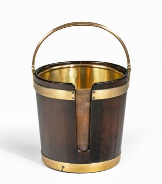 A George III mahogany and brass-bound plate bucket