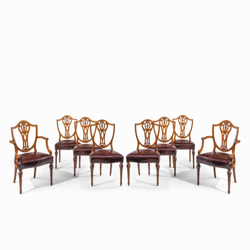Set of eight late Victorian Hepplewhite Revival mahogany dining chairs