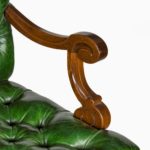 A French mahogany desk chair arm detail