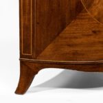 fine pair of George III figured mahogany side cabinets, in the manner of Thomas Sheraton foot
