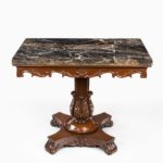 Anglo-Indian mahogany table with Nero portoro marble top by White and Co Calcutta, all on an X-shaped base with scroll feet, stamped ‘White and Co Calcutta’