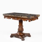 Anglo-Indian mahogany table with Nero portoro marble top by White and Co Calcutta, all on an X-shaped base with scroll feet, Indian