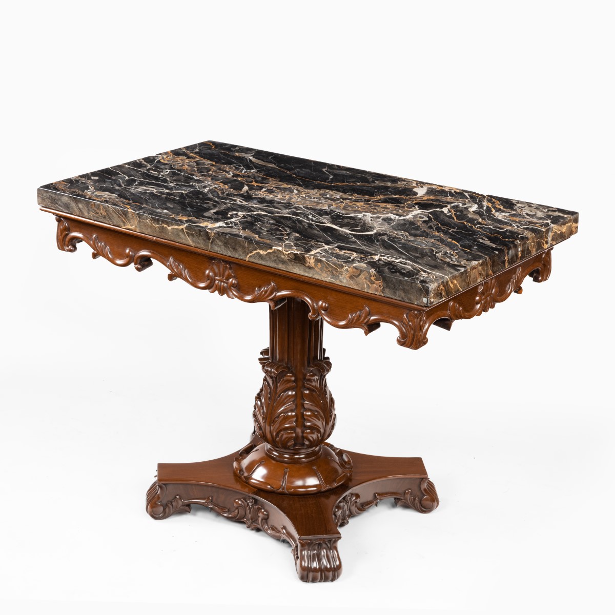 Anglo-Indian mahogany table with Nero portoro marble top by White and Co Calcutta, all on an X-shaped base with scroll feet, stamped ‘White and Co Calcutta’. Indian, circa 1840.