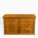 A fine George IV burr oak chest of drawers in the manner of Morel Seddon 1