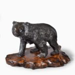 A large Meiji period bronze bear by Genryusai Seiya, singed with a tablet, on later stand, Japanese circa 1880