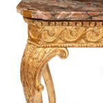 A mid-Victorian gilt-wood console table detail leg