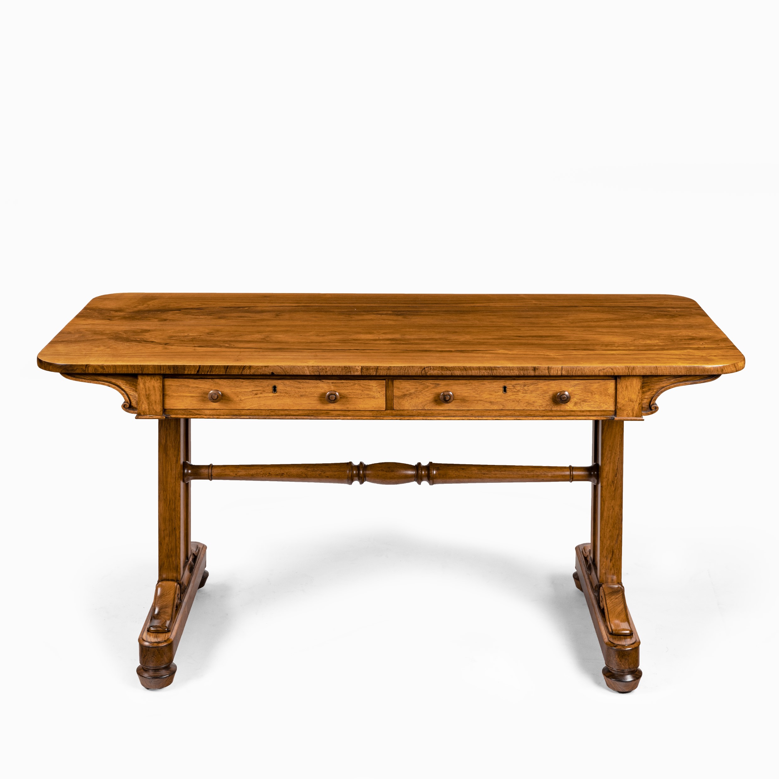 A late Regency rosewood end support table Gillows or Holland and Sons